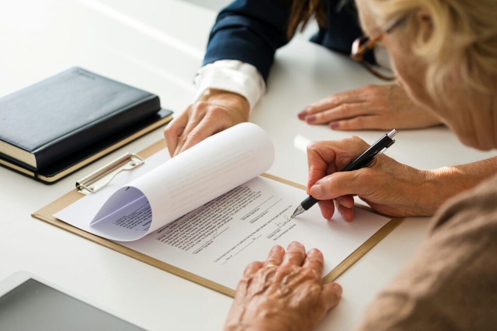 estate lawyer with client reviewing documents