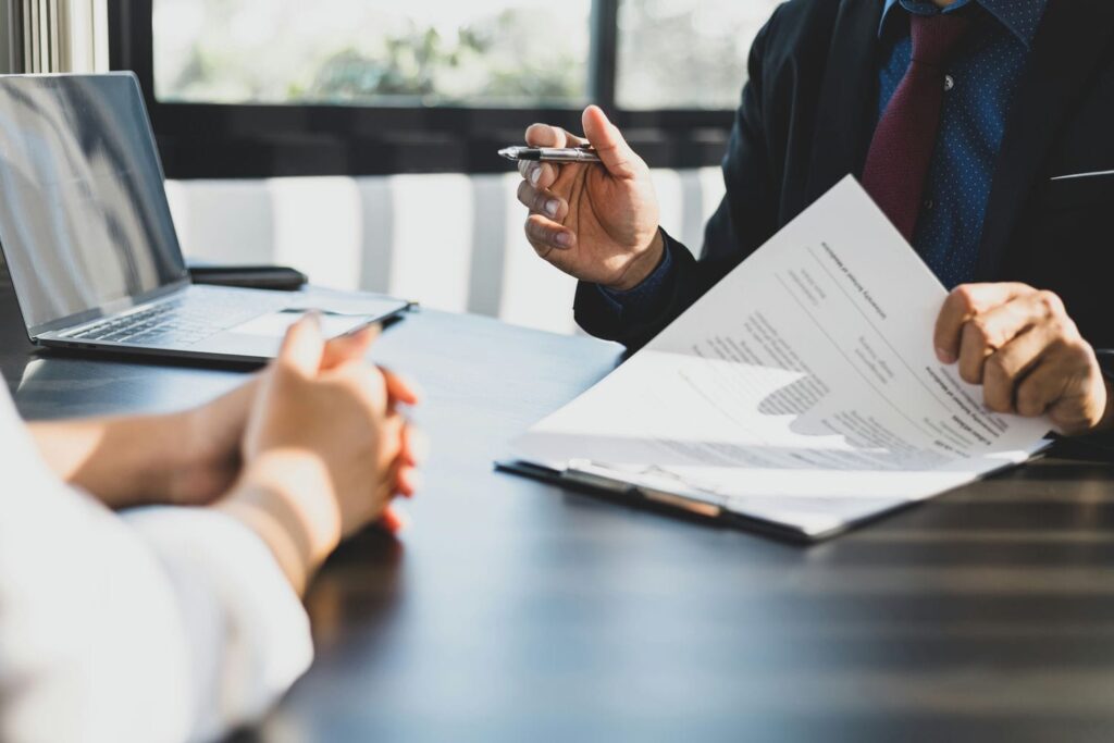 lawyer dicussing business law with client