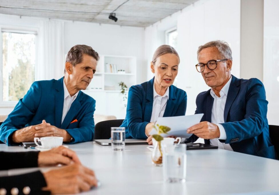 business partners reviewing shareholders agreement